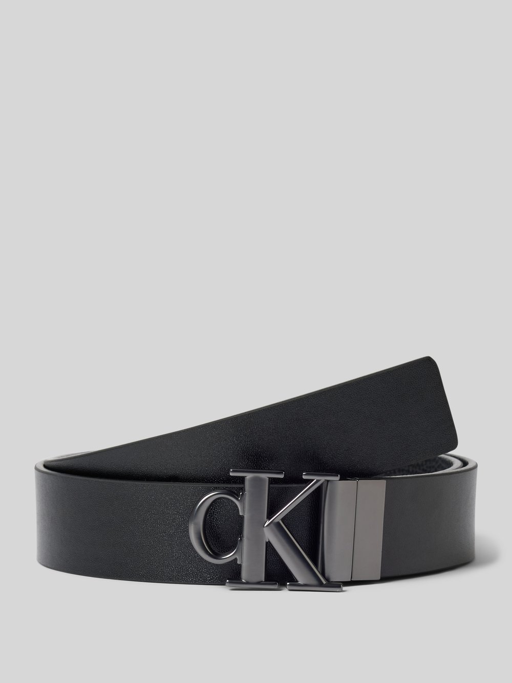 

Ремень с этикеткой CK Calvin Klein, черный