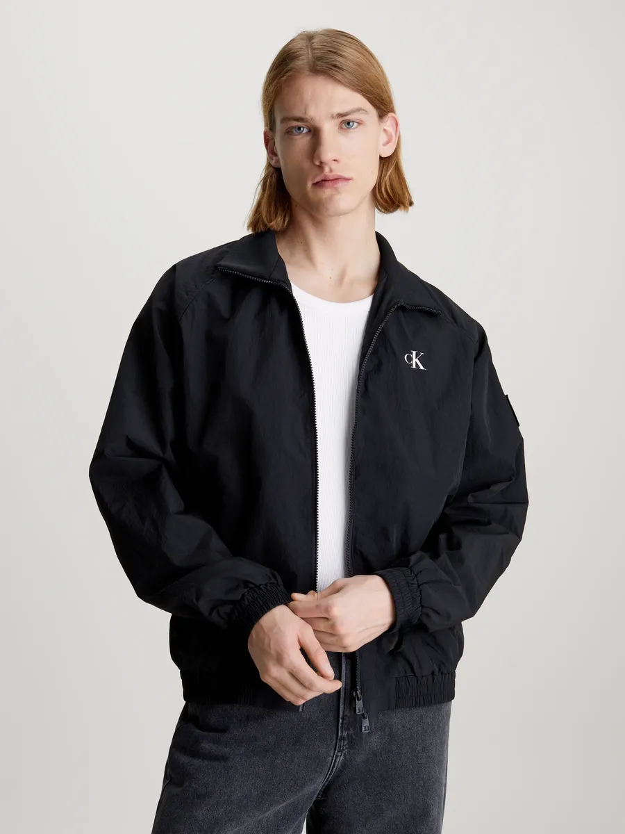 

Куртка Calvin Klein Jeans для активного отдыха "UNPADDED HARRINGTON" со значком с логотипом Calvin Klein, цвет Ck Black
