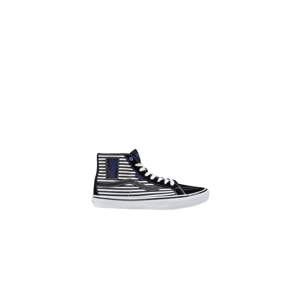 

Черно-белые кожаные кроссовки Vans
