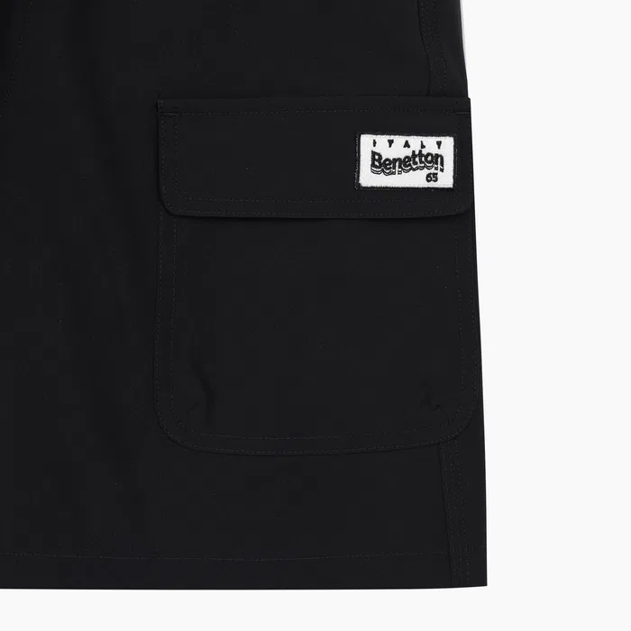 Детские чёрные эластичные шорты 5.5/4 от Benetton Kids — фото 4