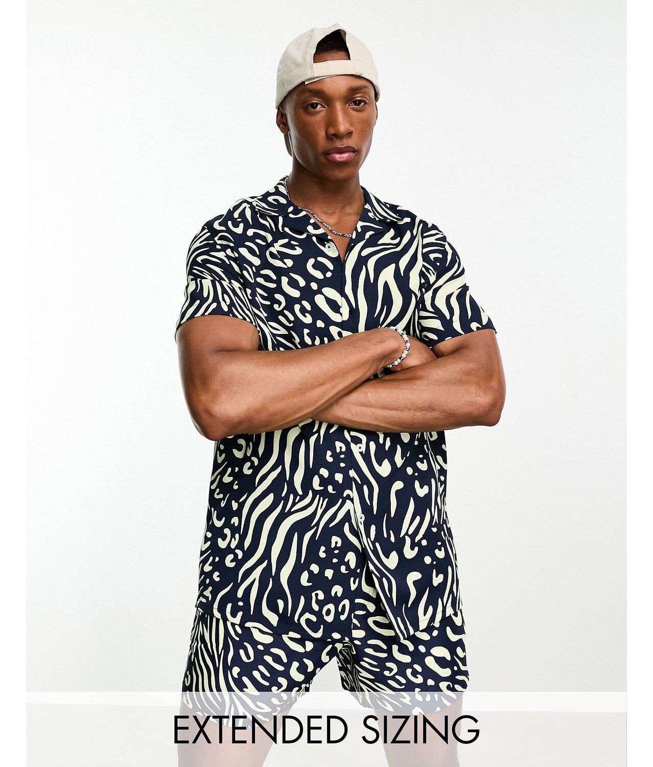 

Темно-синяя рубашка с принтом под зебру ASOS DESIGN co-ord revere