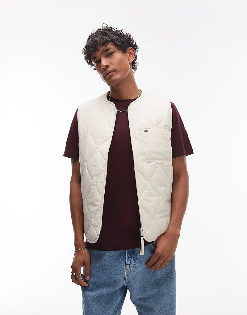 

Стеганый жилет Tommy Jeans бежевого цвета