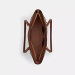 Сумка-тоут Coach Outlet Station из фирменного полотна, золотой/коричневый - фото 2