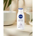 Регенерирующий лосьон для тела Одежда и уход 400мл, Nivea - фото 2