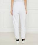 Спортивные штаны женские Guess Jeans хлопковые зауженные, белый - фото 3