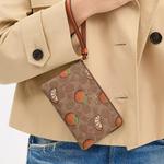 COACH Маленький клатч из лакированного полотна - фото 4