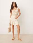 Мини-юбка-годе Coord с желтым цветочным принтом Asos Design - фото
