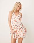 Мини-платье ASOS DESIGN с бретелью через шею и подолом годе с принтом чили - фото