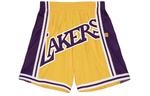 Баскетбольные шорты унисекс Mitchell & Ness, Желтый - фото