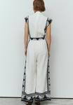 Комбинезон Next Jumpsuit, White Black Placement Floral/White - фото 3