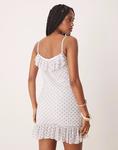 Мини-платье ASOS DESIGN с сетчатым топом и оборками в синий горошек - фото 4