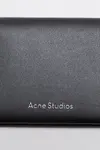 Сложенный кожаный кошелек Acne Studios, черный - фото 4