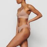 Стринги SKIMS Soft Smoothing Seamless, цвет Sienna - фото 3