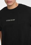 Футболка с принтом KURZARM Guess Jeans, черный - фото 4