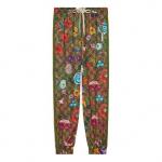 Брюки flora gg supreme pattern track pants Gucci, коричневый - фото