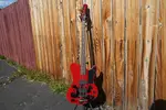 Электрический бас-гитар Schecter DIAMOND SERIES Simon Gallup Ultra Spitfire Red с 4 струнами - фото
