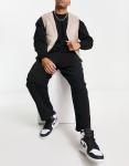 Черные широкие укороченные джоггеры оверсайз ASOS DESIGN - фото