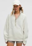 Толстовка lululemon Scuba Funnel Neck Oversized, Light Ivory Gold/White - фото