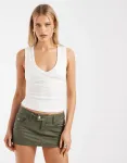 Зеленые мини-юбки Hollister - фото