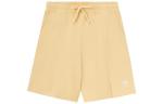 Повседневные шорты женские желтые New Balance - фото