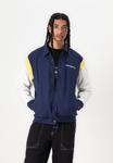 Куртка New Balance ATHLETICS VARSITY JACKET, Navy /Blue - фото 4