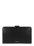 Calvin Klein Кошелек в черном цвете - фото
