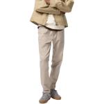 UNIQLO Джинсы унисекс бежевые - фото