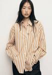 Блуза Mango Button-down blouse, Off-White - фото