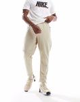 Спортивные брюки Nike Training Unlimited Dri-FIT бежевого цвета - фото 2