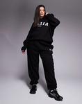 Черные джоггеры с вышитым логотипом Kaiia Plus на манжетах - фото