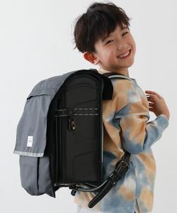 Вместительный водоотталкивающий чехол для школьного рюкзака со светоотражающим элементом. Детская одежда, весна/лето 2026.