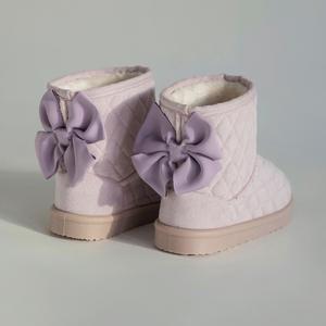 Стеганые сапоги с лентами