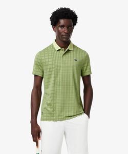 Поло-рубашка Даниила Медведева с принтом в виде ракеток по всей поверхности