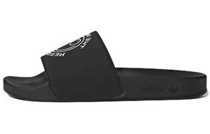 Шлепанцы и сланцы Adidas Originals Adilette Slide AndrГѓВ© Saraiva The World Needs Love