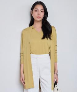 Длинный синтетический кардиган высокой плотности, пригодный для стирки.