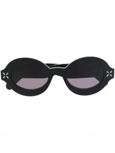 Солнцезащитные очки в овальной оправе Alaïa, черный