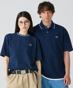 Поло-рубашка из трикотажа в рубчик, подобранная по цвету. Цвет: индиго.