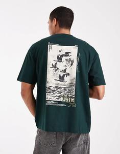 Футболка ASOS DESIGN свободного кроя с сувенирной графикой темно-зеленого цвета