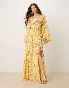 Длинное платье ASOS DESIGN с длинными рукавами, вырезами, юбкой со сборками и желтым цветочным принтом