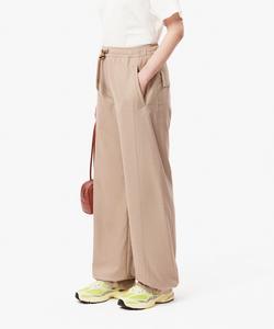 Широкие фланелевые брюки драпированного кроя / широкие брюки зауженного кроя