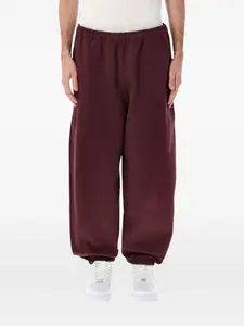 Спортивные брюки с вышитым логотипом Nike, красный