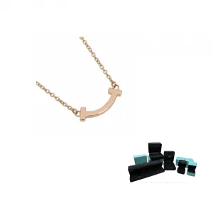TIFFANY & CO. Кулон с бриллиантом T Smile Mini из розового золота 18 карат 2010-х годов