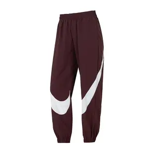 Женские повседневные брюки AS W NSW LOGO MR JGGR Nike, красно-белый