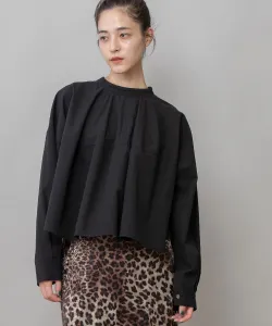 Хлопковая широкая укороченная блузка, которую можно носить как самостоятельно, так и в руке.