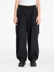 Брюки UA Unstoppable с накладными карманами Under Armour, черный