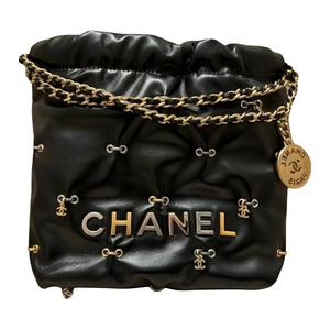 CHANEL Миниатюрная женская сумка из коровьей кожи черного цвета