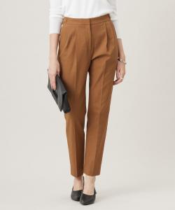 Зауженные брюки из ткани свободного кроя