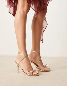 Гламурные босоножки на каблуке-банте в золоте