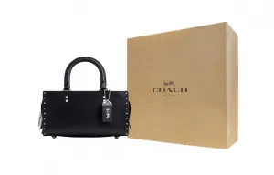 COACH Чёрная женская сумка через плечо среднего размера