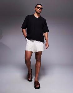 Трикотажное поло свободного кроя с разрезом на шее ADPT черного цвета